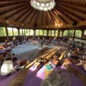 Yoga teacher training group in round pavilion