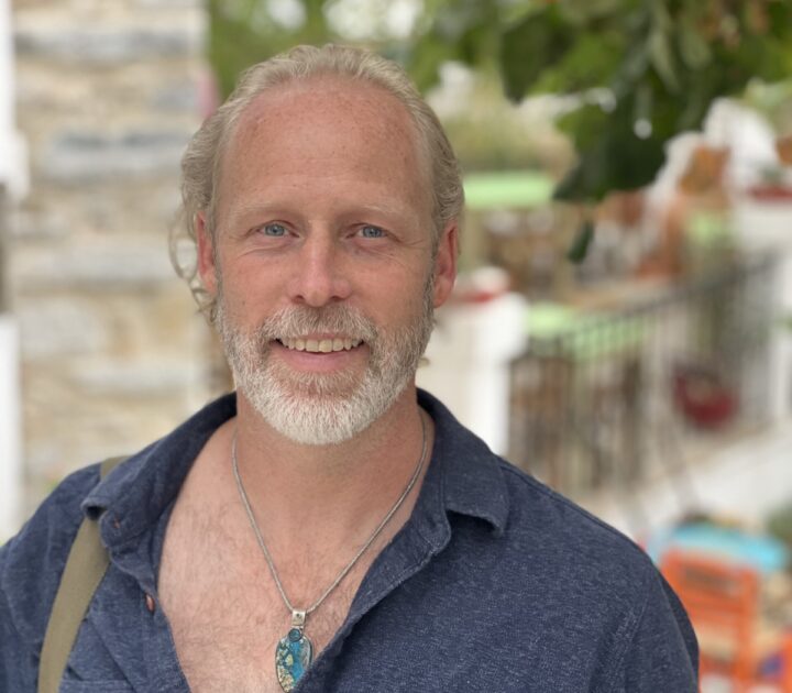 Michael Shankara portrait with crystal necklace